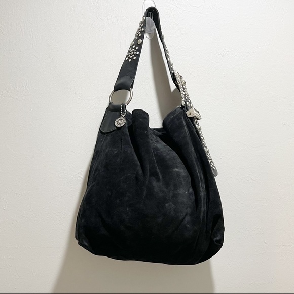 beth dutton black purse